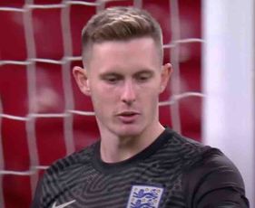 Man Utd's Dean Henderson reacts to making his England debut