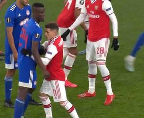 Photo: Arsenal's 5ft 5in Lucas Torreira marking Olympiacos' 6ft 3in Ousseynou Ba