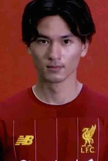 Photos: Takumi Minamino poses in Liverpool shirt