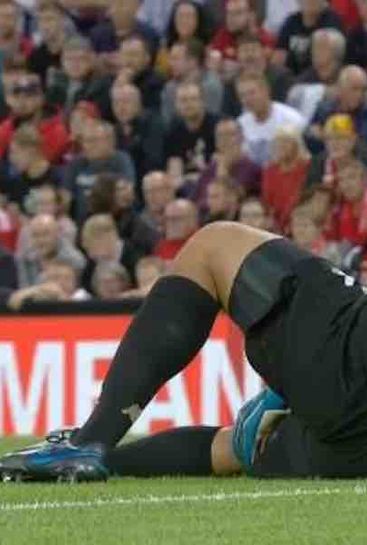 Alisson Becker reacts to injury sustained vs Norwich
