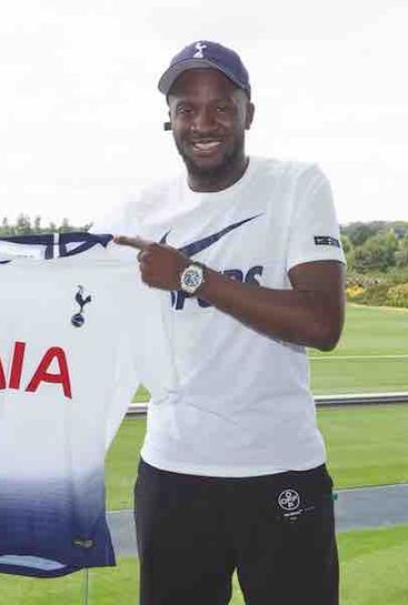 Photo: Tanguy Ndombele poses with Spurs shirt