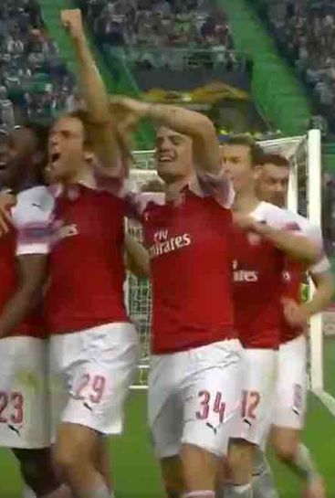 Arsenal players react to beating Sporting Lisbon
