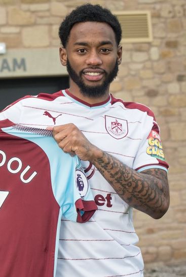 Photo: Spurs' Georges-Kevin Nkoudou poses with Burnley shirt after loan move