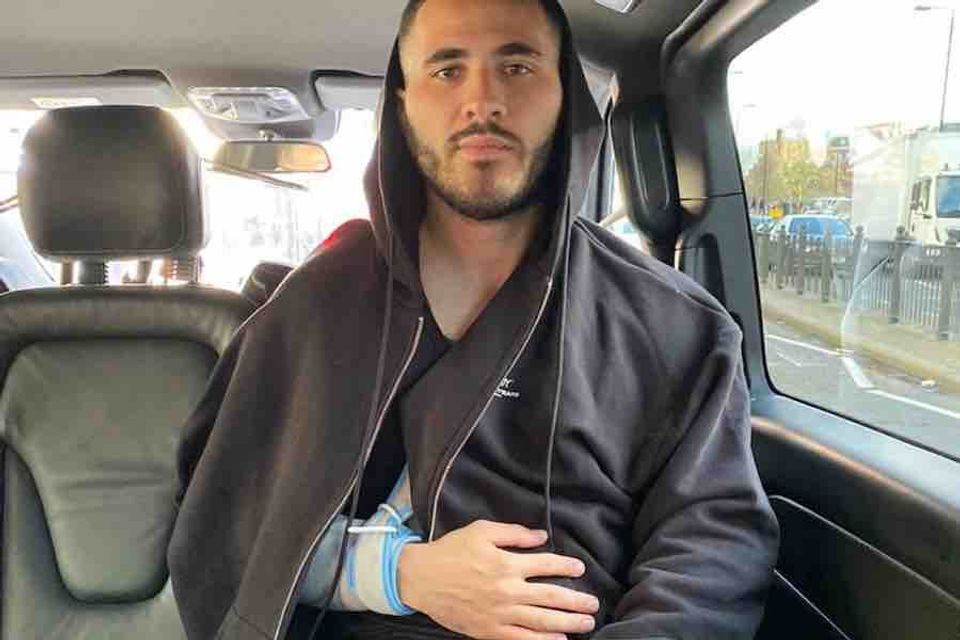 Photo: Injured Arsenal man Sead Kolasinac with his arm in a sling