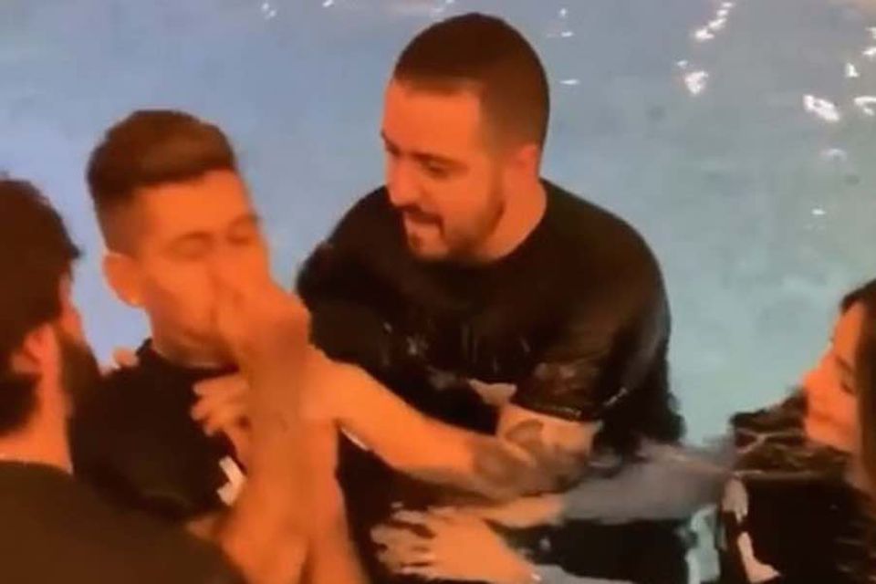 Video: Alisson Becker helps to baptise team-mate Roberto Firmino