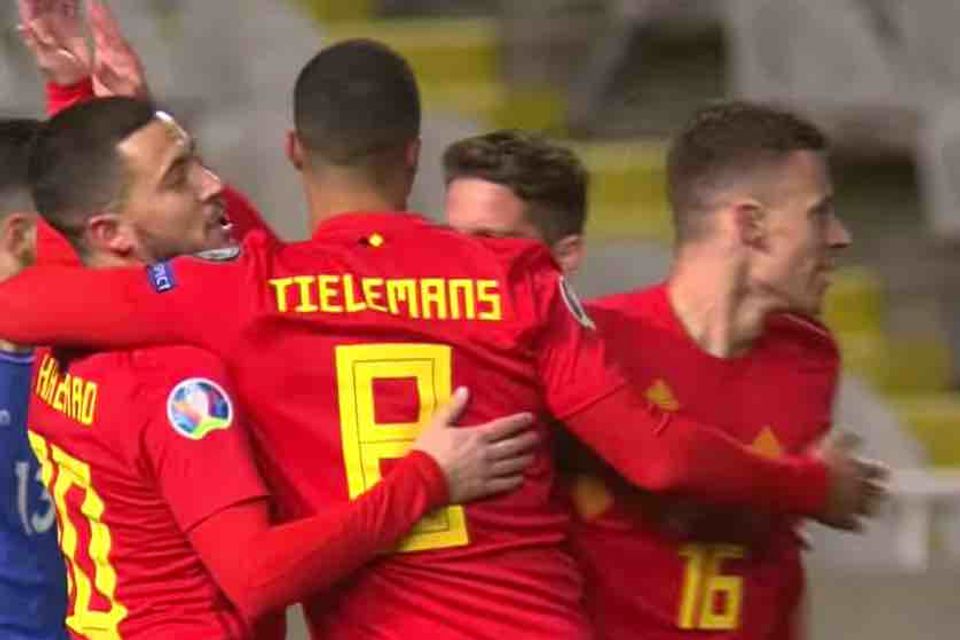 Chelsea's Eden Hazard reacts to winning his 100th cap for Belgium
